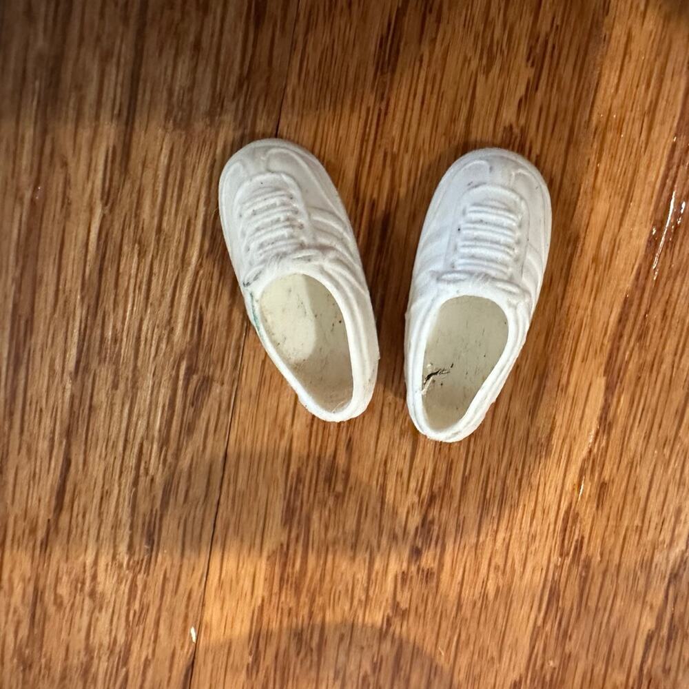 Vintage white sneakers sized for Barbie